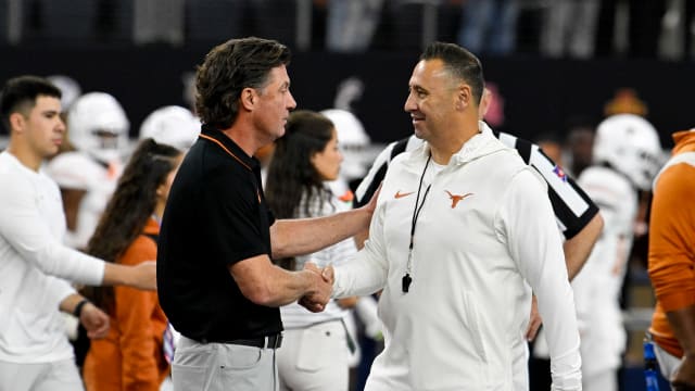 steve sarkisian mike gundy 44